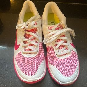 Nike sneakers free runs. Maybe worn once or twice